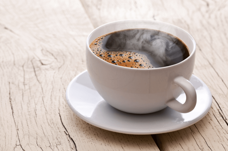 cup-of-steaming-coffee-on-a-table